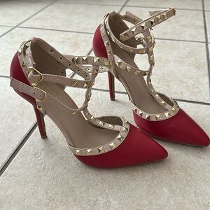 Selling red high heels ( used ) only worn once. In good condition runs true size